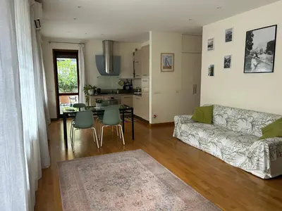 a living room with a couch and a table at Rifugio Belsito in Rome