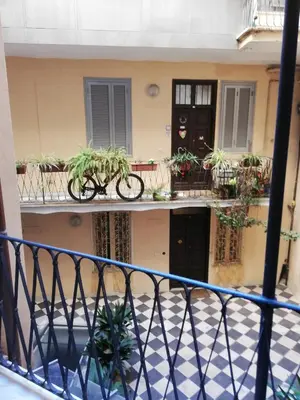 a bike on the balcony of a building at la casa sul cortile in Rome
