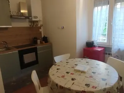 a white bathroom with a toilet and a sink at MC Apartment Trastevere in Rome