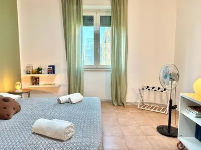 a bathroom with a shower and a toilet and a sink at Marconi Living in Rome