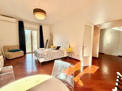 a bathroom with a toilet and a sink at Marconi Living in Rome