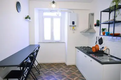 a kitchen with a sink and a counter top at Apartment 29 in Rome