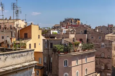 a group of buildings with plants on the roofs at iFlat Vatican & Navona apartment with nice view in Rome