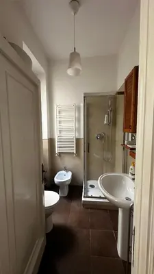 a bathroom with a shower and a toilet and a sink at ColleVaticano Roma in Rome