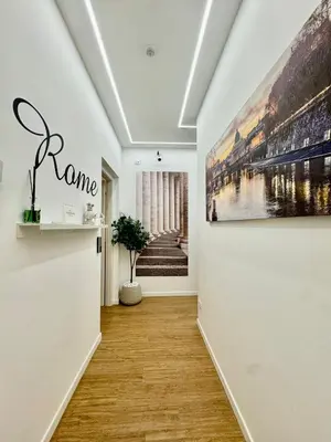 a hallway with a painting on the wall at King's Place in Rome