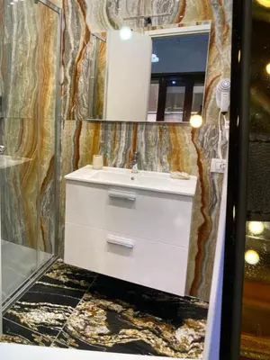 a bathroom with a sink and a mirror at Caos Calmo House in Rome