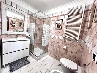 a bathroom with a shower and a toilet and a sink at Rome Is Home in Rome