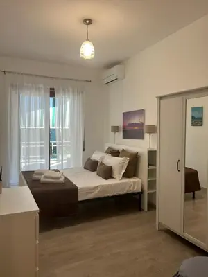 a bedroom with a bed and a window at Appartamento San Pietro Alla Cupola in Rome