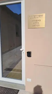 a sign on the door of a building at LUXURY Amazing Appia Antica - CELIO in Rome