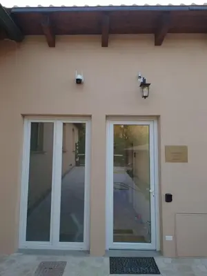 two glass doors on the side of a building at LUXURY Amazing Appia Antica - CELIO in Rome