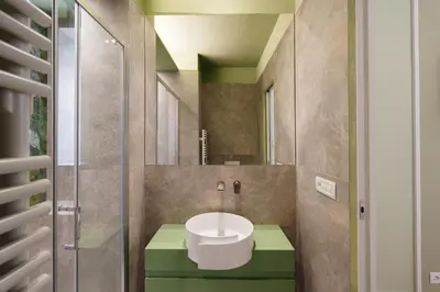 a bathroom with a sink and a mirror at Firenze Boutique Rooms in Rome