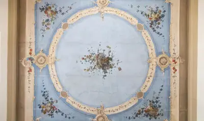 a painting of a wreath on a wall at Roma magica in Rome