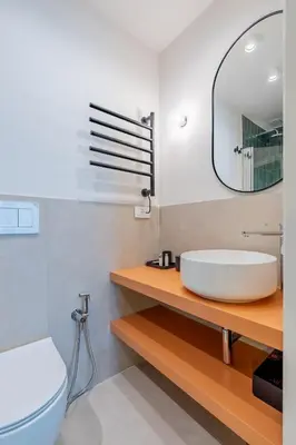 a bathroom with a white sink and a toilet at UNICO Suite - GRUPPO BLAM in Rome
