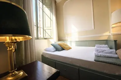 a bathroom with a toilet and a shower and a sink at Veronica Suite, Historic Centre Piazza Venezia in Rome