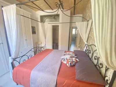 a bed with two pillows on it in a bedroom at Testaccio Charme Apt in Rome