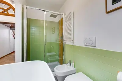 a bathroom with a shower and a toilet at Casa Valentina - Oasi di tranquillità e stile a Testaccio in Rome