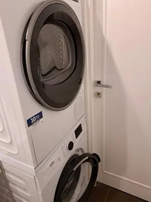 a washing machine sitting next to a washer at Casa Lilli in Rome