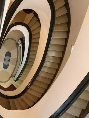 a spiral staircase in a building at Casa Lilli in Rome