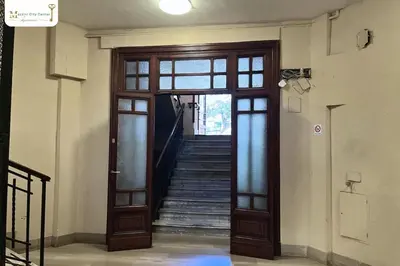 an open door with stairs in a building at Mazzini City Center Apartment - Vaticano - Foro Italico - Stadio Olimpico-Rai Delle Vittorie in Rome