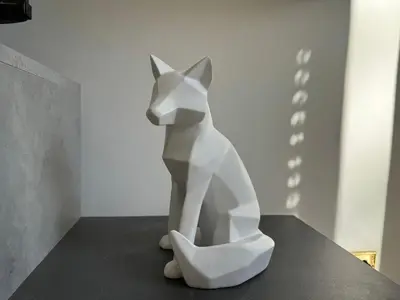 a white sculpture of a cat sitting on a table at Domus Urbani in Rome