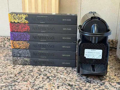 a stack of wine boxes sitting on a counter at Domus Urbani in Rome