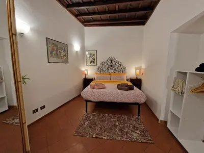 a bedroom with a bed in a room at Simple life in Rome in Rome