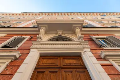 a building with a wooden door on top of it at Domus Romana Musei Vaticani in Rome