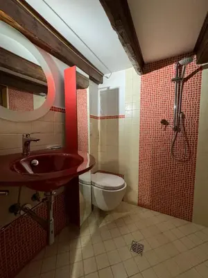 a bathroom with a sink and a toilet and a shower at Al 25 Trastevere, Roma in Rome