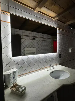 a bathroom with a sink and a mirror at Al 25 Trastevere, Roma in Rome