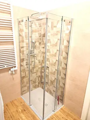 a shower with a glass enclosure in a bathroom at San Giovanni Metro Flat in Rome