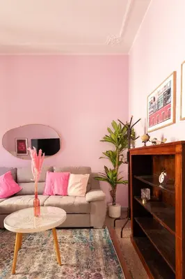 a living room with a couch and a table at Rétro Chic Circo Massimo in Rome