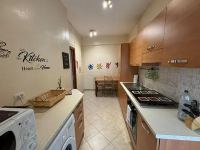 a kitchen with a stove top oven next to a stove top oven at Hidden Gem in Magliana in Rome