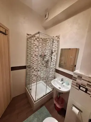 a bathroom with a shower and a sink at Roma Trastevere Holiday in Rome