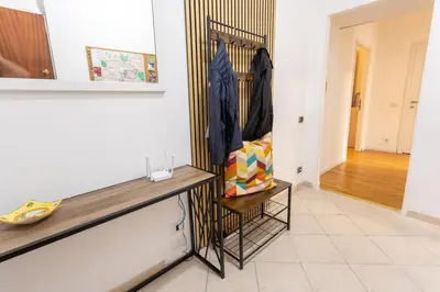 a living room with a counter and a hallway at 