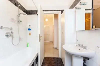 a bathroom with a sink and a shower at B&B all'ombra del Vaticano in Rome