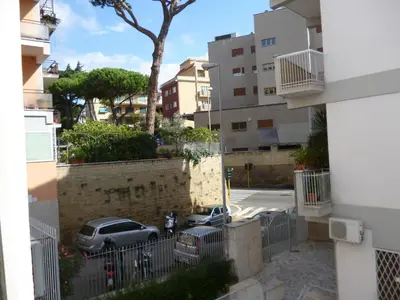 a view of a parking lot from a building at B&B all'ombra del Vaticano in Rome