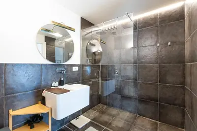 a bathroom with a sink and a mirror at Campani by Rental in Rome in Rome