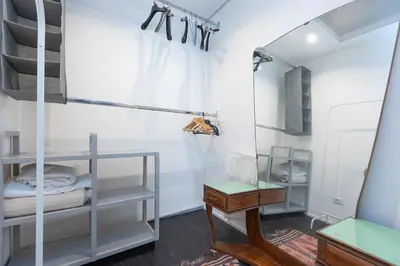 a room with bunk beds and a mirror at Campani by Rental in Rome in Rome