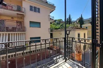 a balcony with a view of a building at 4BNB - Angelo Emo in Rome