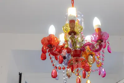 a colorful chandelier hanging from a ceiling at Ripa by Rental in Rome in Rome