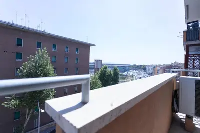 a view of a building from a balcony at Carlotta Stylish Apartment Close Tiburtina Station in Rome
