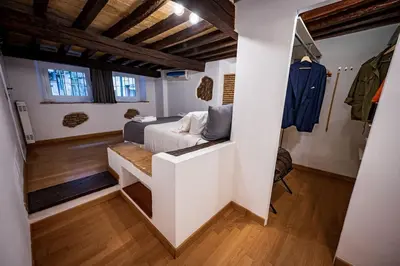 a bedroom with a bed in a room at Pantheon Appartamento Costaguti in Rome