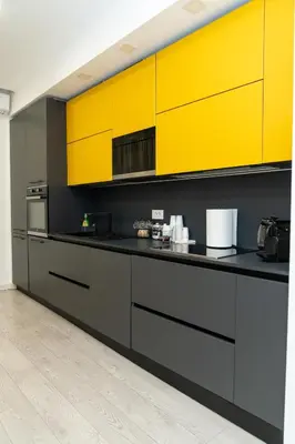 a kitchen with a black oven in a kitchen at Emm Maison Rome in Rome