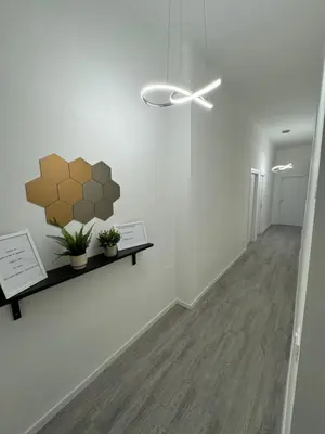 a hallway with a wall with a heart on it at San Paolo Apartment in Rome