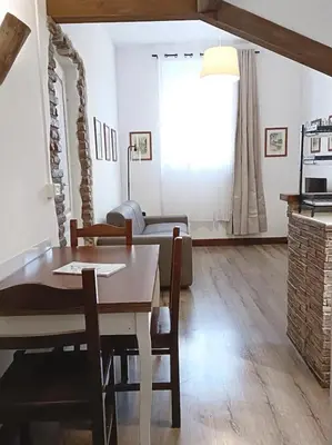 a living room with a table and a couch at Apartment B4 in the center of Rome WiFi and AC in Rome