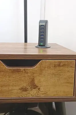 a router sitting on top of a wooden desk at Apartment B4 in the center of Rome WiFi and AC in Rome