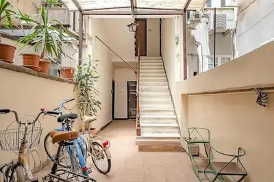 a house with two bikes parked in a hallway at Apartment B4 in the center of Rome WiFi and AC in Rome