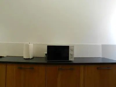 a microwave sitting on top of a counter at Giuseppe Apartment in Rome
