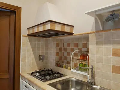 a kitchen with a sink and a stove at Living Rhome-SpanishSteps in Rome
