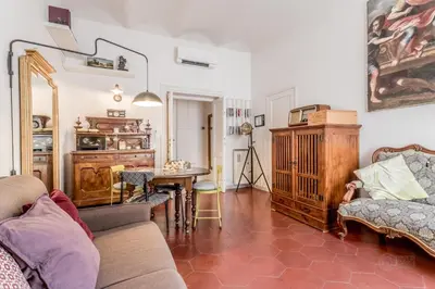 a living room with a couch and a table at 